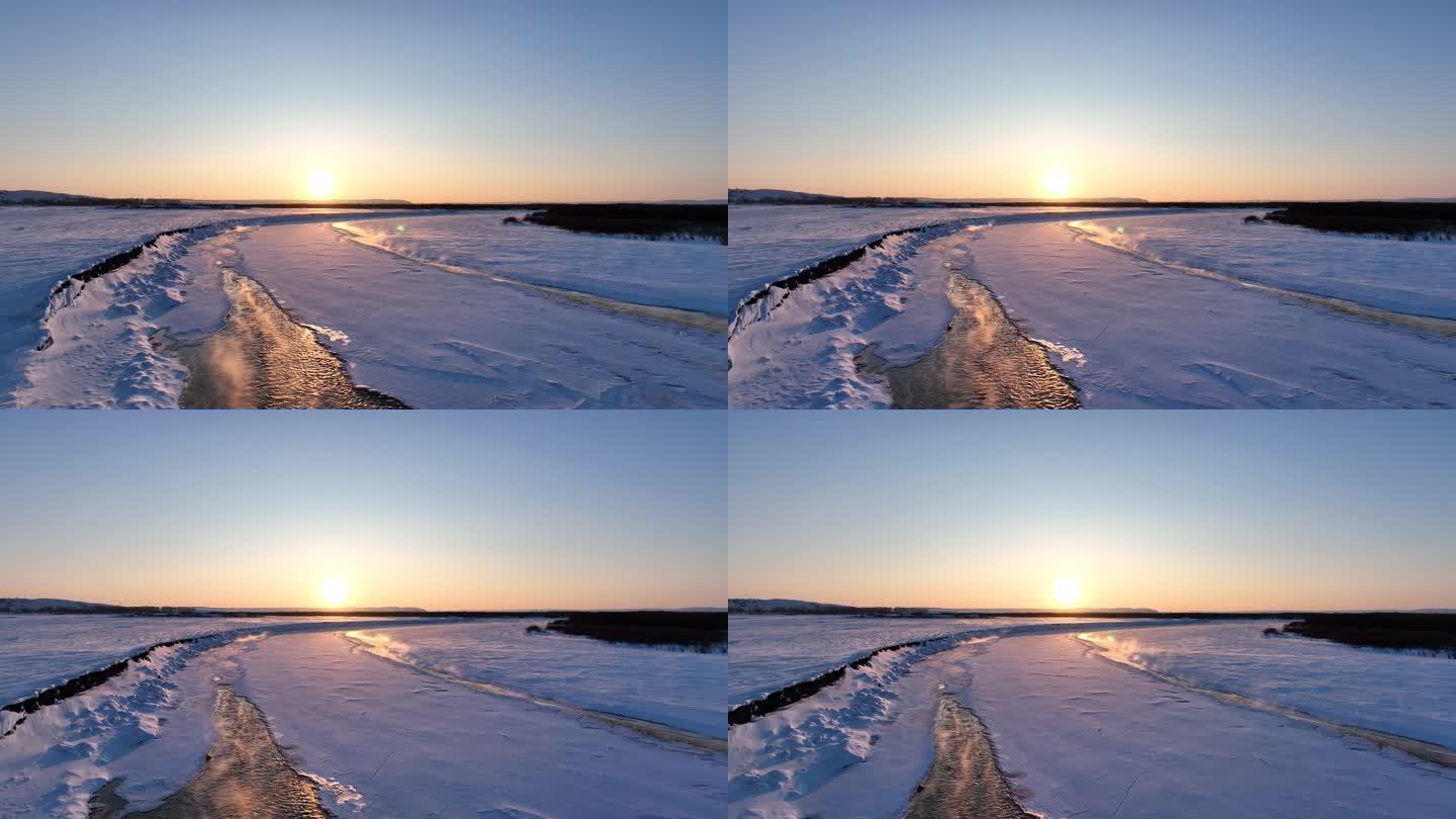 航拍冬季雪原冰河迷雾夕照