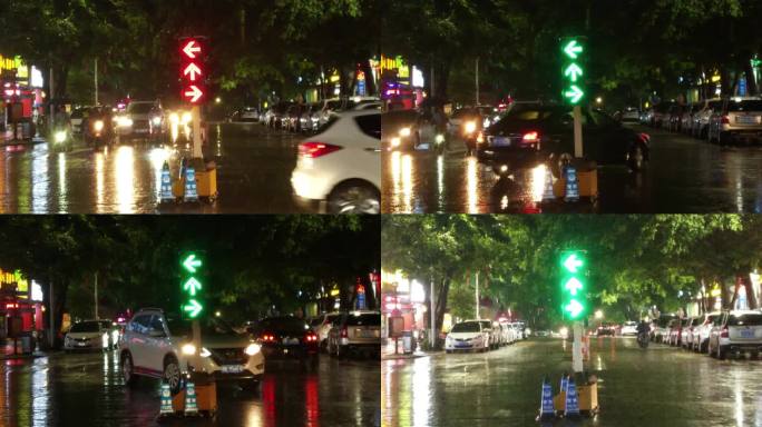 深夜雨夜小城下暴雨雨滴雨水雨中街红灯转换