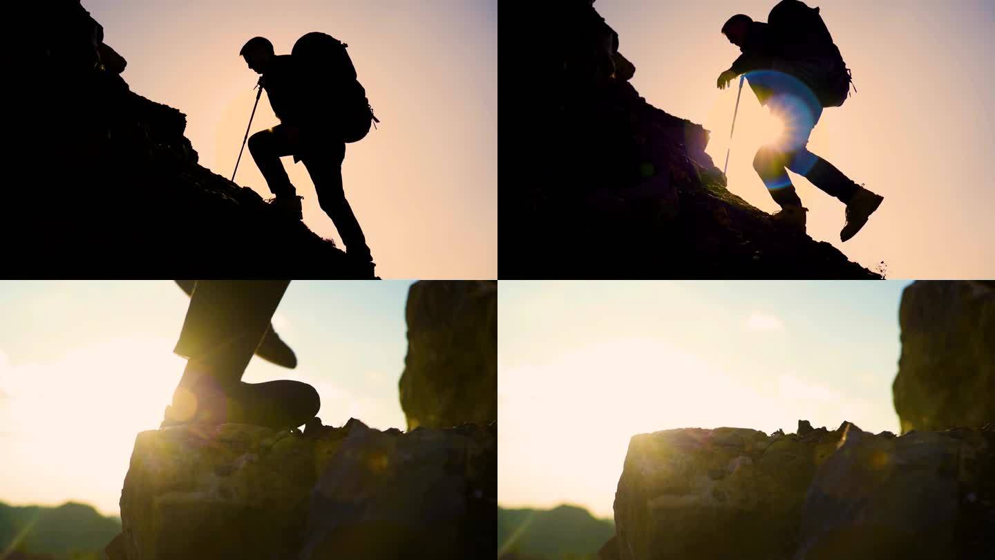 爬山逆光 登山 团队协作手拉手协助登山包