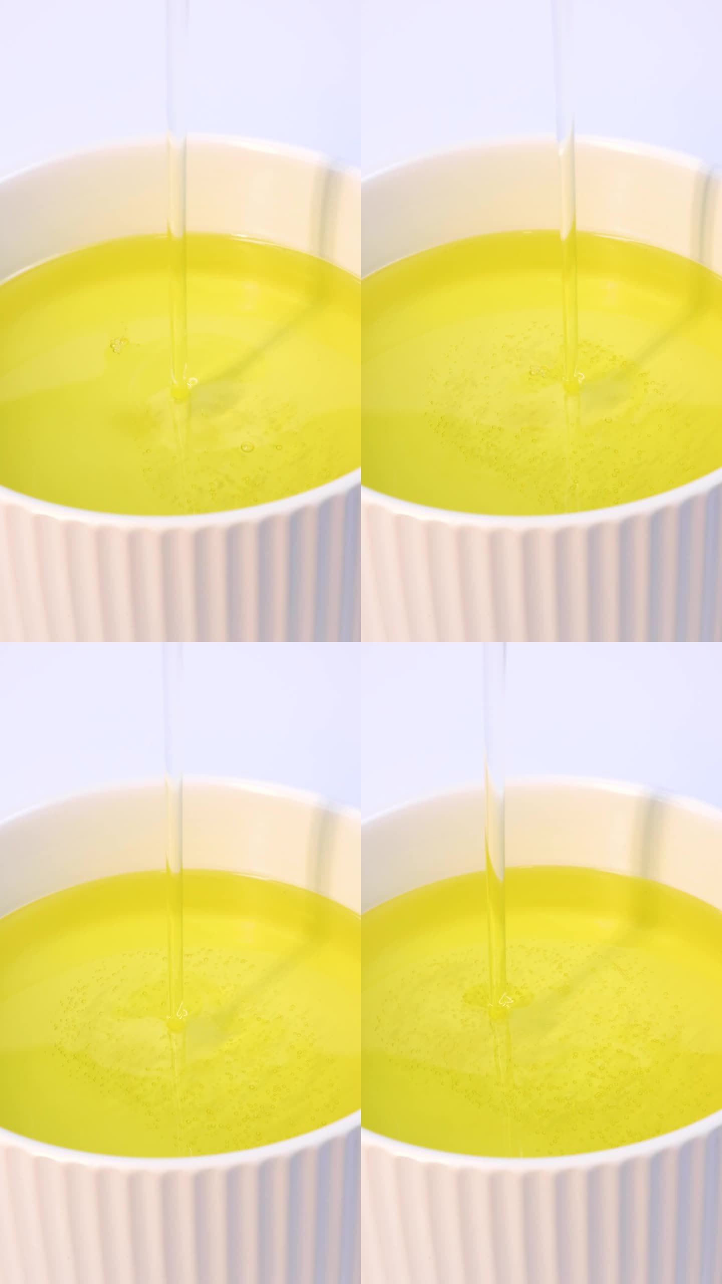 油竖屏升格黄色金色液体润滑油橄榄油慢动作