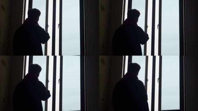 孤独身影男人窗边抽烟背影吸烟剪影工作压力