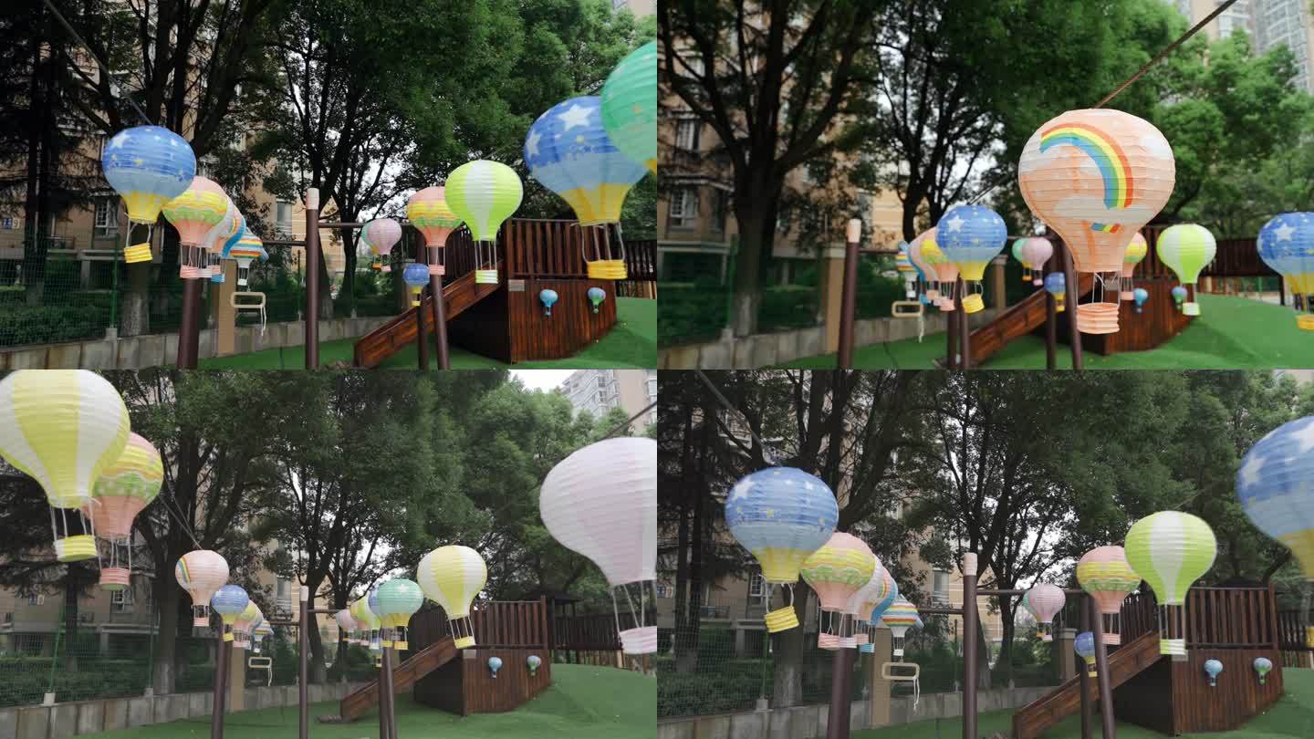 幼儿园里的纸热气球布置中秋晚会