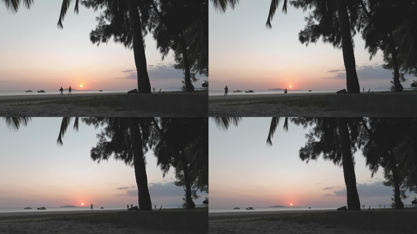 夕阳下的滩涂渔船海岸落日