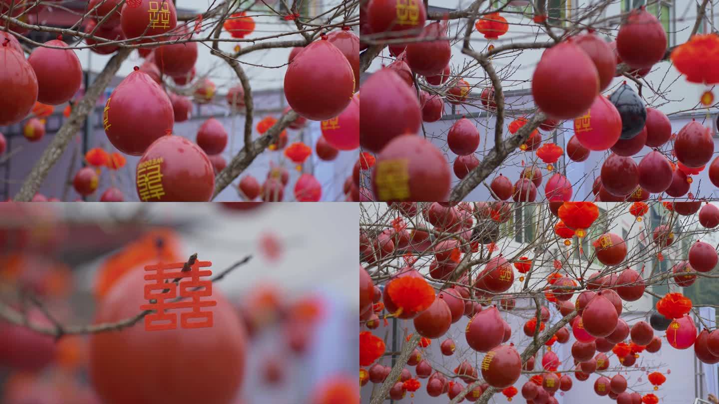 结婚场景布置树上挂满红气球