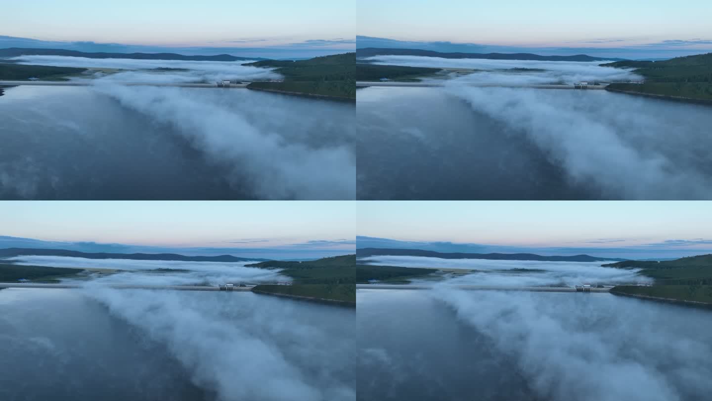 航拍晨雾缭绕的高原湖泊