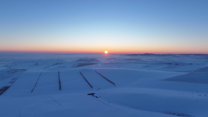 航拍内蒙古雪域雪原日落