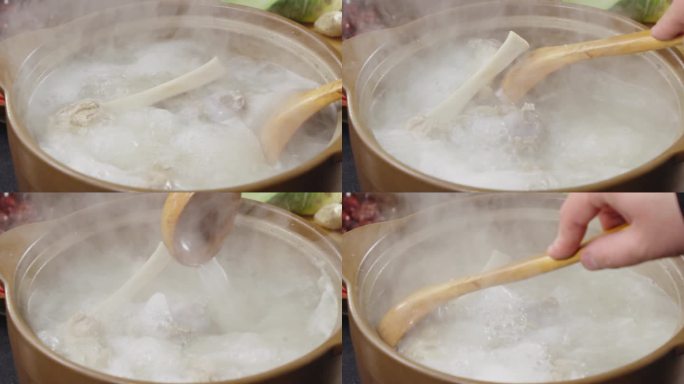 勺子搅拌在砂锅里炖煮的骨汤