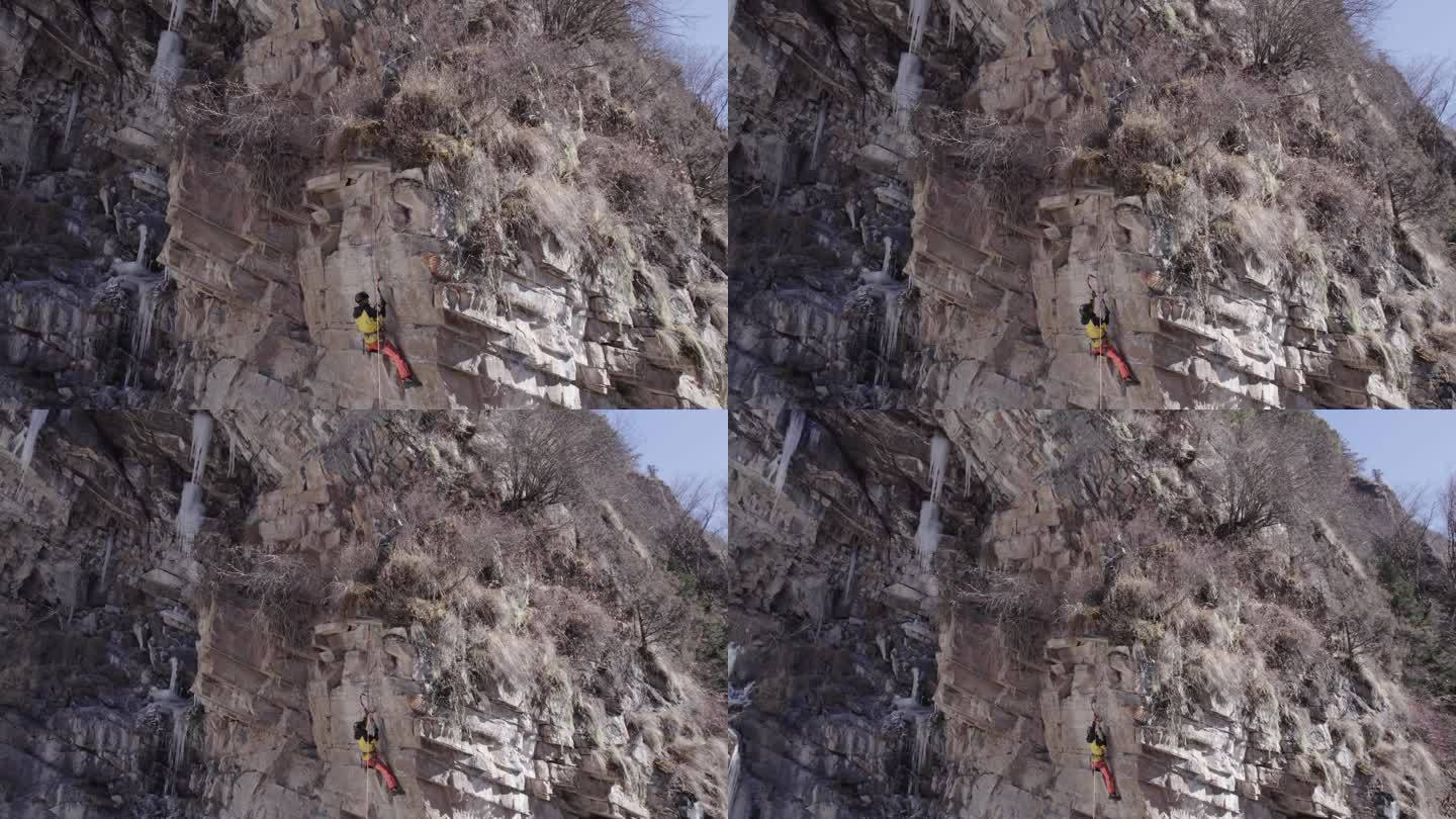 攀岩者在山体上进行干攀运动