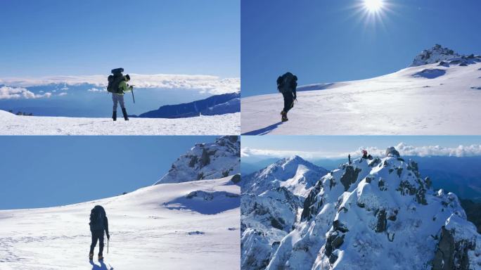 登山者的背影在雪山顶上眺望勇攀高峰