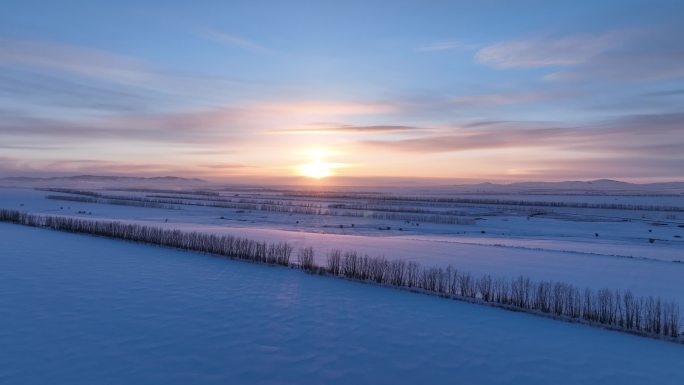 航拍内蒙古雪域雪原日落