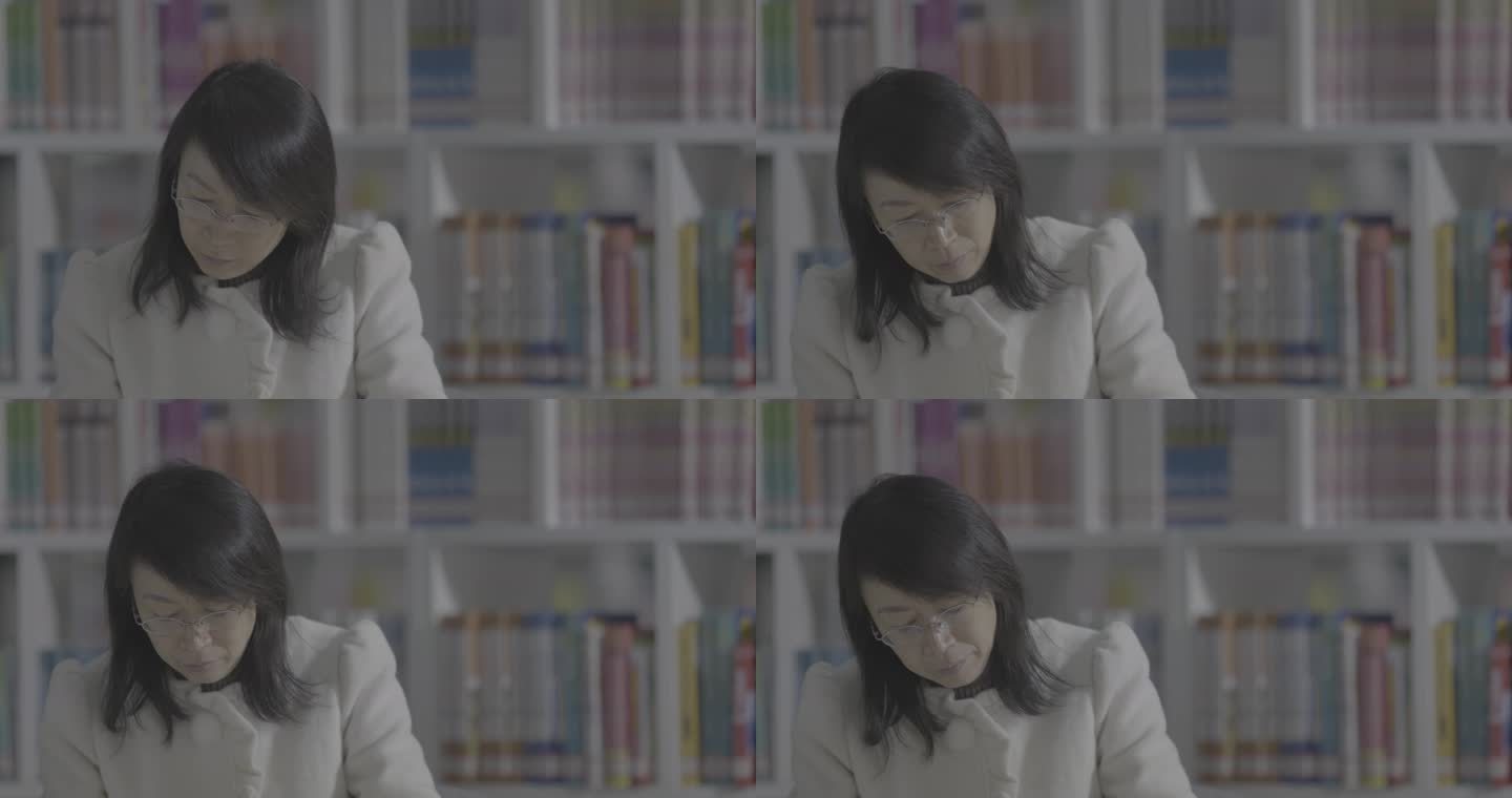 【4K灰度】中年女子图书馆看书读书