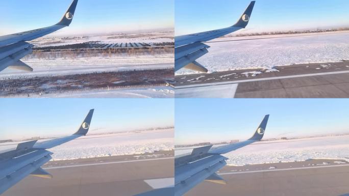 雪地降落的飞机4k原视频实拍