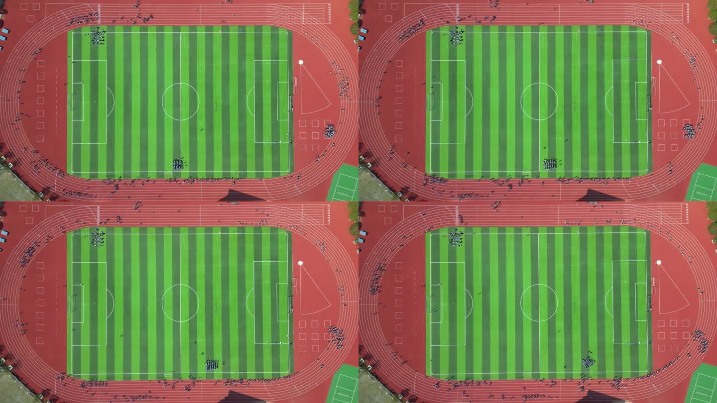 俯瞰校园足球场跑道学生体育跑步