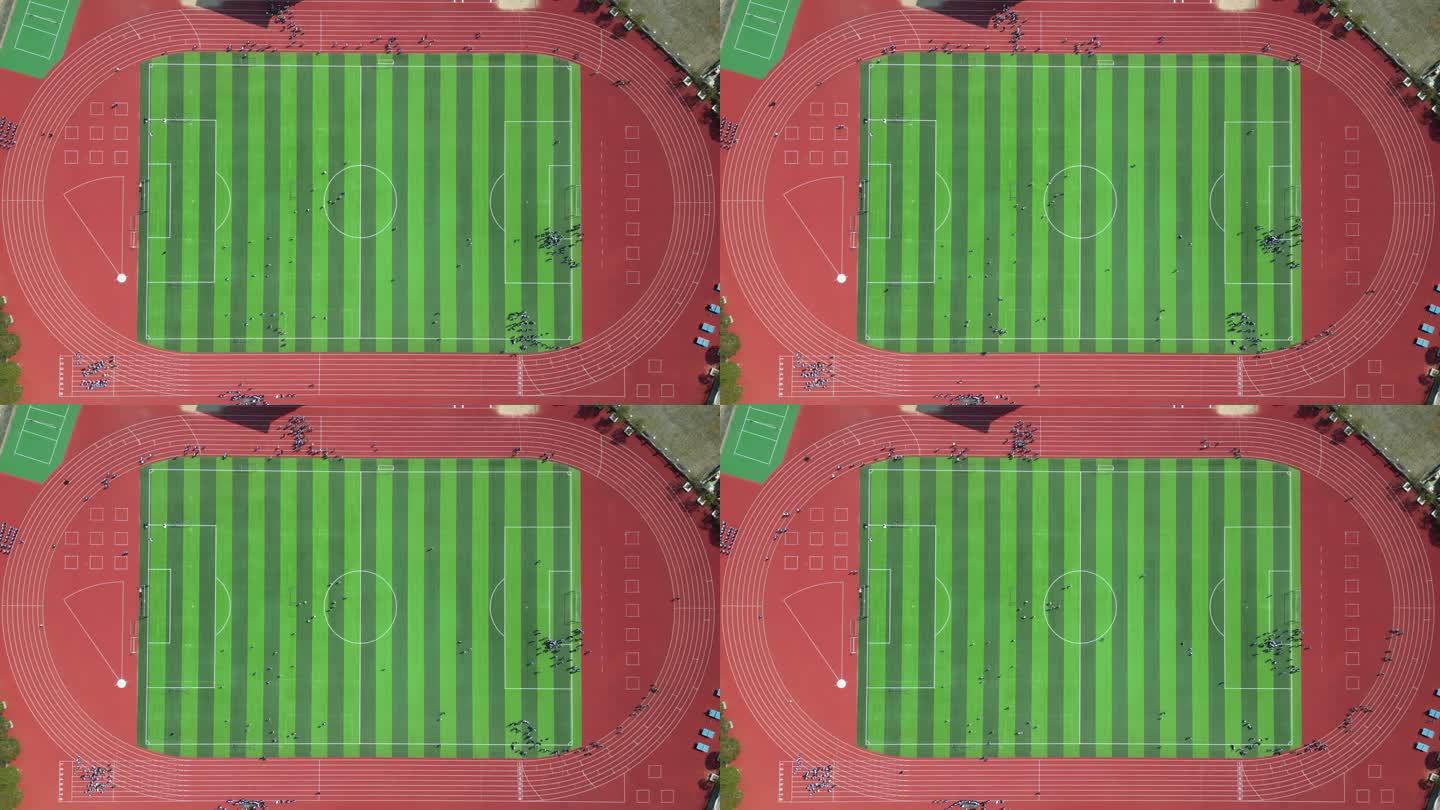 俯瞰校园足球场跑道学生体育跑步