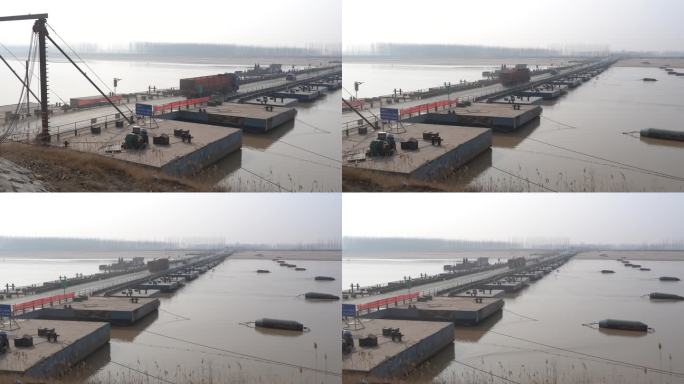 黄河河水上的浮桥和行驶的车辆河中的浮桶