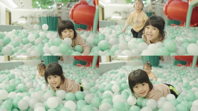 游乐园 小孩   小朋友 玩气球 微笑