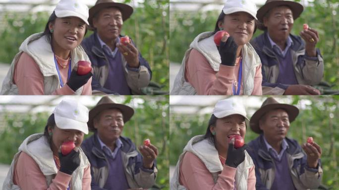 果农对着镜头笑 果农吃苹果 果农吃水果