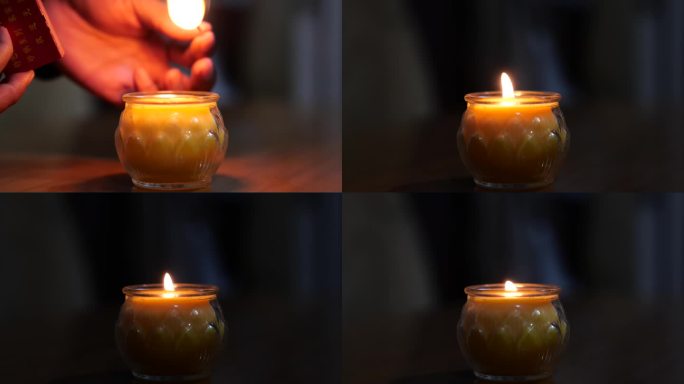 用火柴点燃蜡烛，点燃酥油灯视频