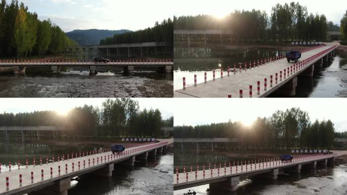 航拍车过桥夕阳河流