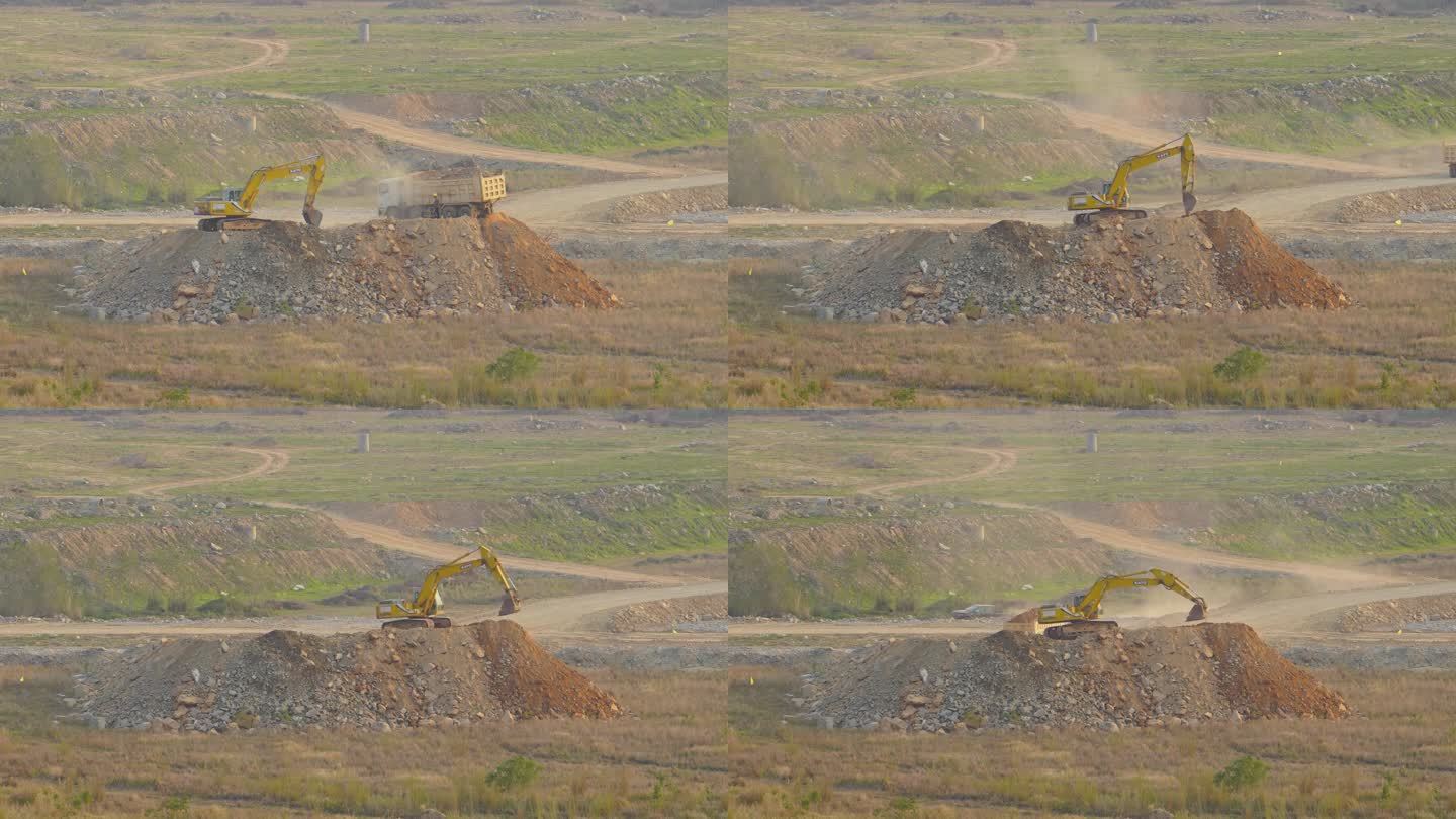 项目工地泥头车卸车延时挖土机推平作业