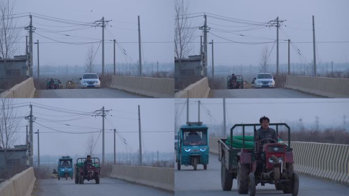 乡村农村农民结束一位男人开着拖拉机经过