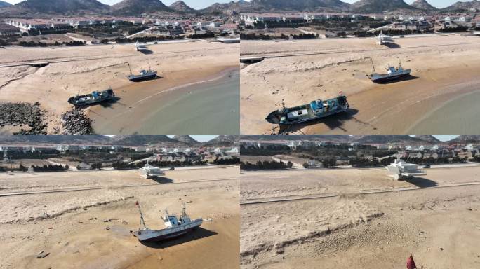 航拍山东荣成马栏湾海边的沙滩渔船