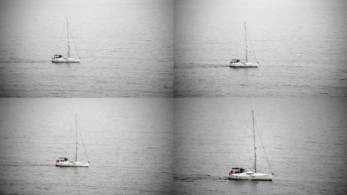 帆船游艇在平静海面远距离拍摄4k