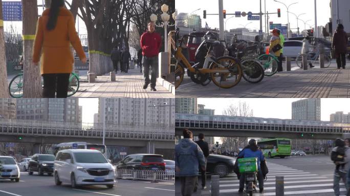 车流行人公交车城市人文骑电瓶车下班过马路