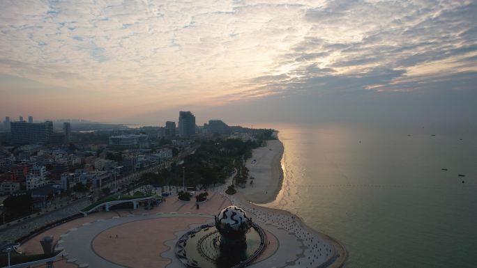 北海银滩海上日出朝阳潮雕广场城市风光航拍