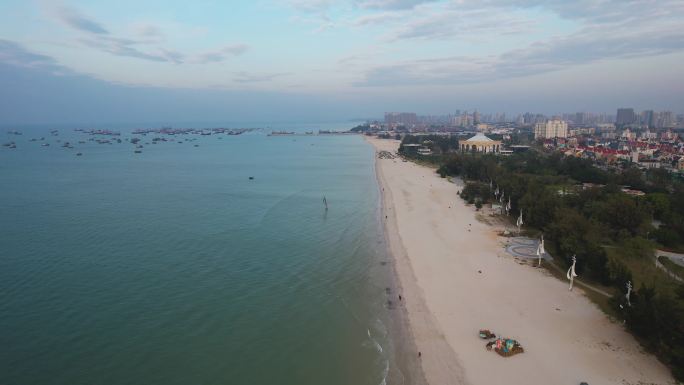 北海银滩海上日出朝阳潮雕广场城市风光航拍