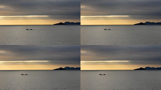 海上早晨波光粼粼中的渔船
