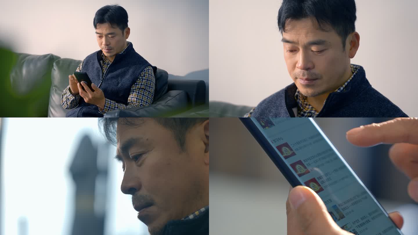 中年男性党员在手机上浏览学习强国内容