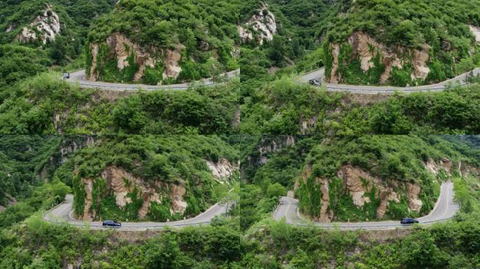 汽车驶过山路弯道航拍