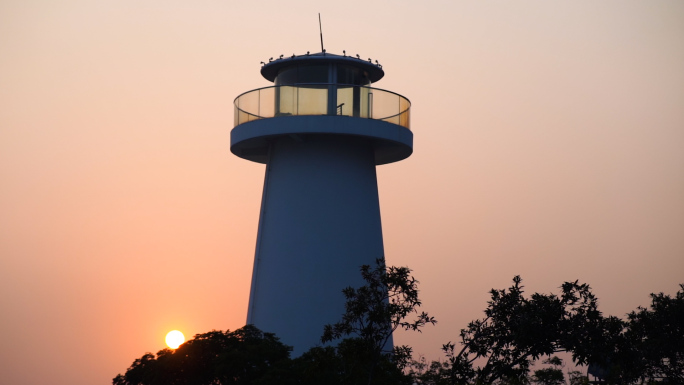 夕阳海边灯塔空境