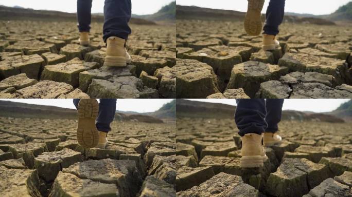 干旱土地行走脚步脚踩裂缝前行保护水资源