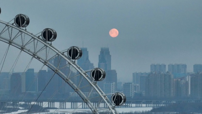 4K哈尔滨城市冰雪摩天轮月亮元宵节航拍
