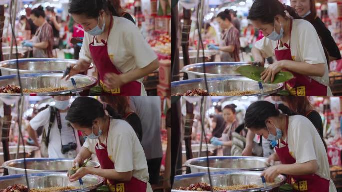 端午节成都马鞍街技艺娴熟的女人飞快包粽子