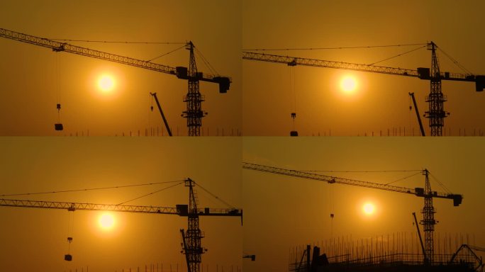 城市建设工地写意-逆光夕阳吊塔剪影