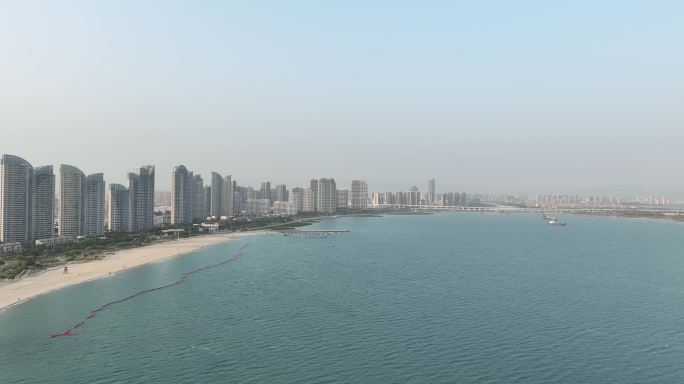 厦门城市海岸线航拍同安区海滨沙滩海边小区