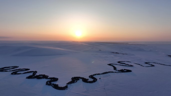 航拍内蒙古雪原特泥河暮色