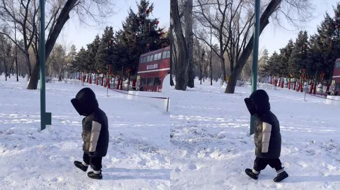 孩子雪地踩雪