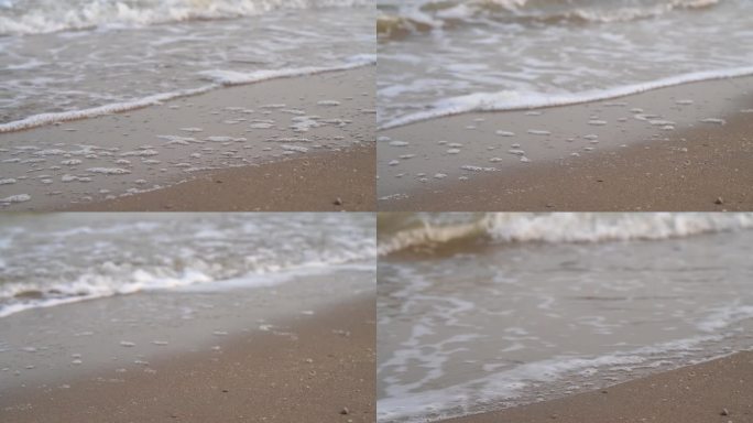 浪花特写海浪海水冲击沙滩浪花泡沫