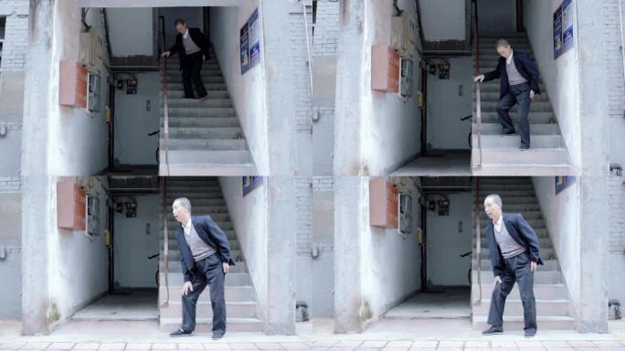 【4K】社区老人步履蹒跚走下楼梯