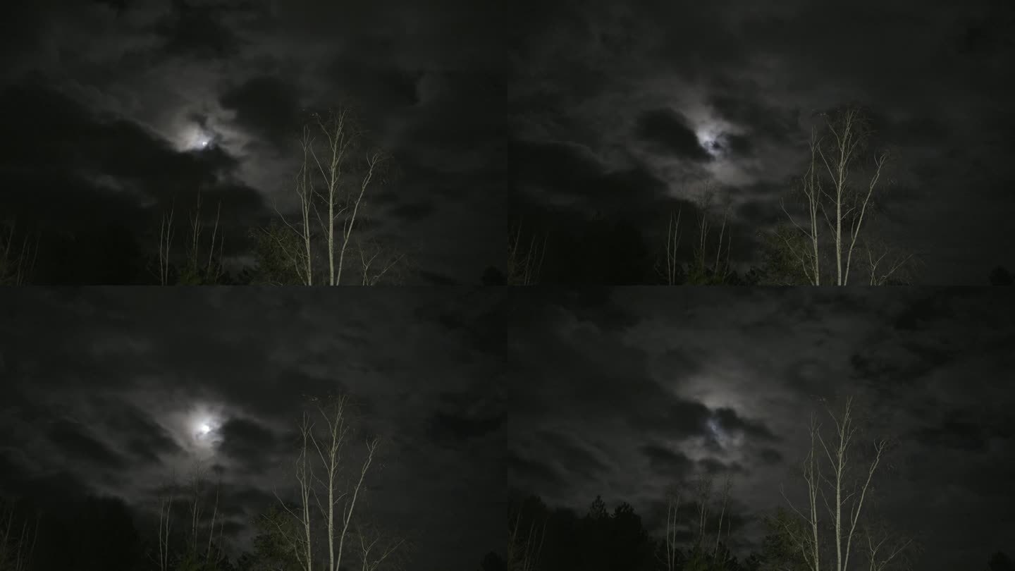 夜晚明月和移动的云层