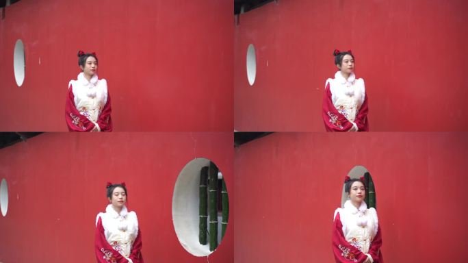 古装汉服美女在红墙下走动走在红墙
