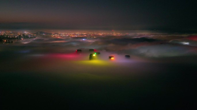 夜晚平流雾上的高楼大厦4K航拍