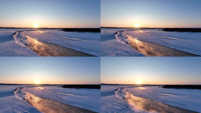 航拍冬季雪原冰河迷雾夕照