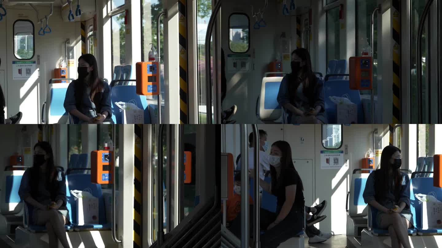广州地铁观光有轨电车乘客黄昏光影