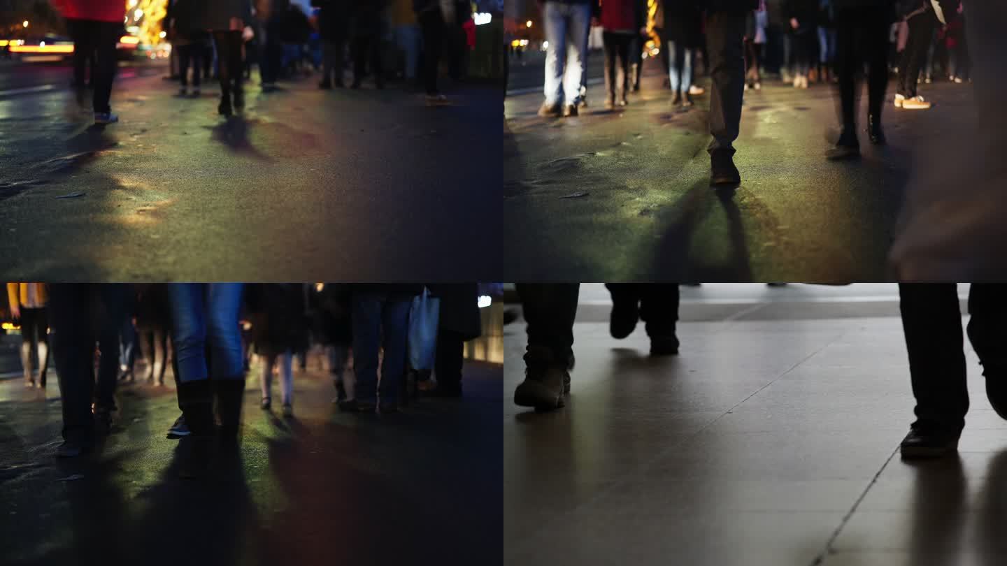 夜晚广场上路上匆匆行走的脚步