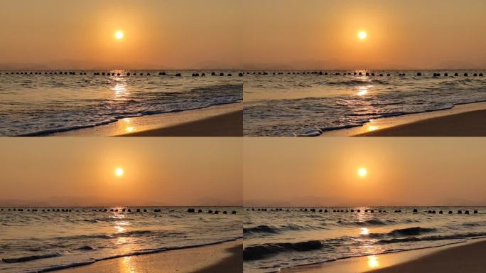 夏日海滩上的日落夕阳